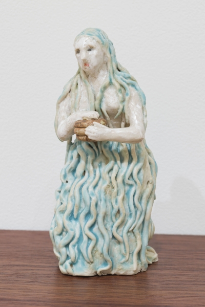 figure with blue hair 